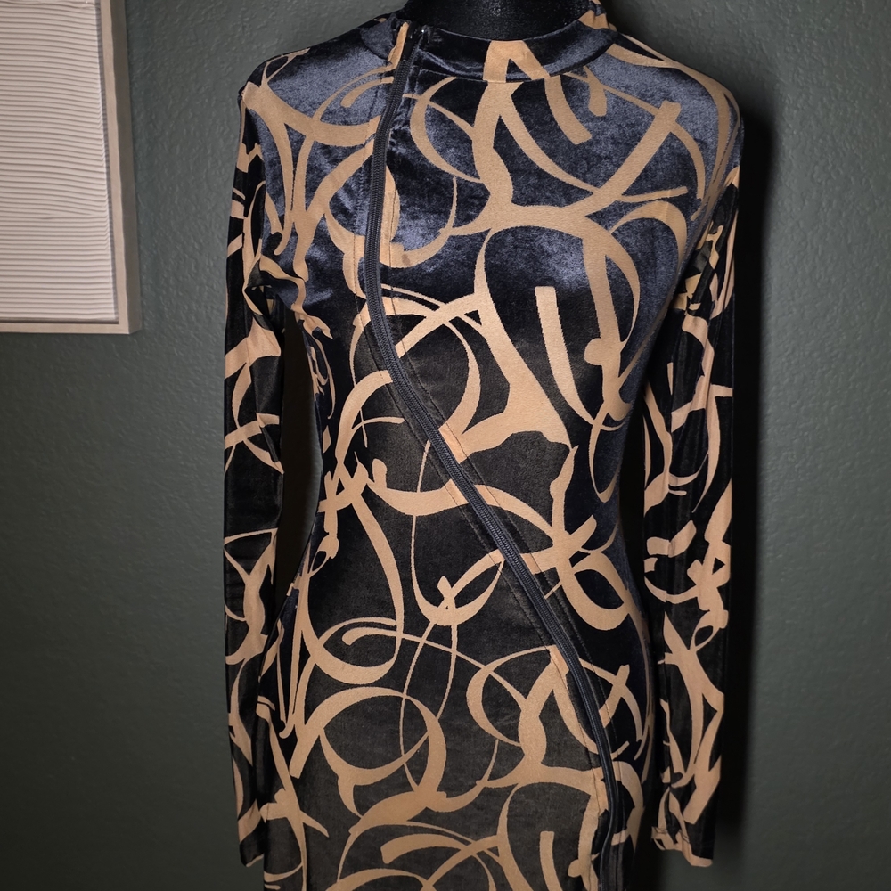 Elegant Black and Gold Patterned Dress